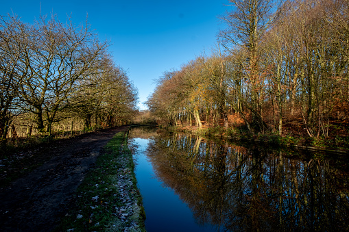 Bright winters morning on the Leeds and Liverpool Canal in the North West England, UK