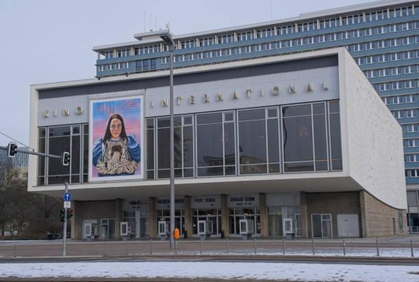 kino international on the karl marx allee in berlin. sunny winter day. selective focus - winter city germany brandenburg imagens e fotografias de stock