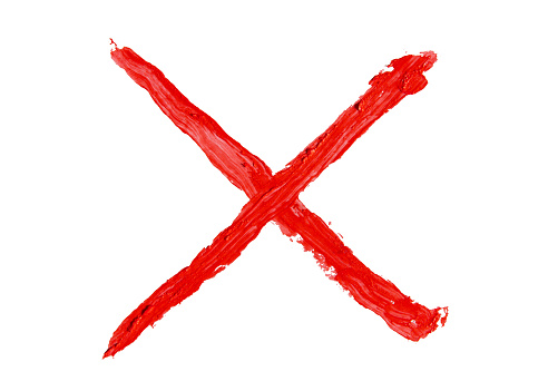 X mark painted with thick red oil paint on white background with clipping path