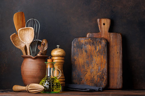 Culinary essentials: Diverse cooking utensils and spices on kitchen table