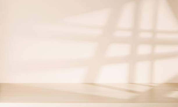 istock Wooden table and sunlit wall, product template 2010388779