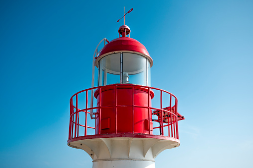 Red and white lighthouse.
