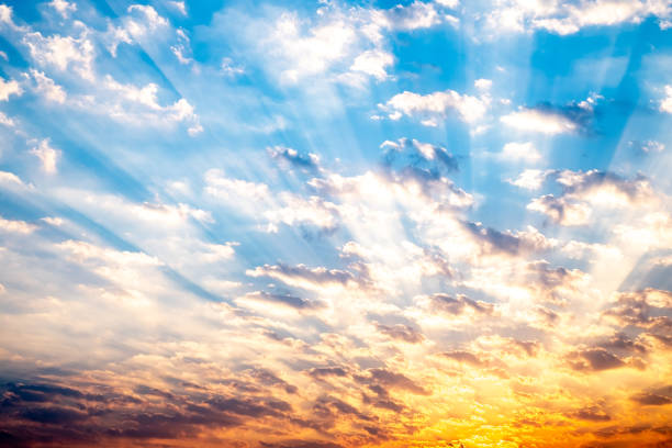 Sky, sunrise, sunset, luxury soft gradient orange gold clouds and gold sunlight between group of blue clound sky perfect for the background, take in everning,Twilight, high definition landscape photo