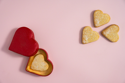 Heart shaped cookies for Valentine's Day. The cookies are photographed from above and there is copy space in the middle of the Valentine's Day photograph