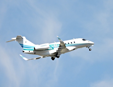 Boca Raton, Palm Beach County, Florida, USA, February 13, 2024. An Embraer 550 fixed wing multi engine (14 seats / 2 engines) N995RG taking off from the Boca Raton Airport.