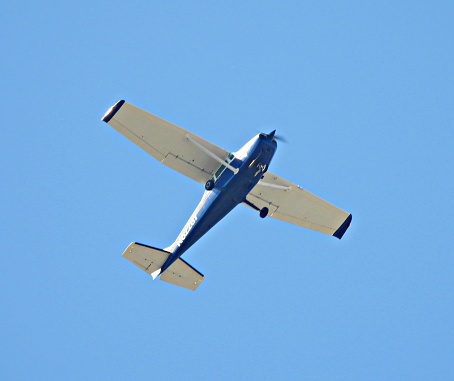 Boca Raton, Palm Beach County, Florida, USA, February 13, 2024. A Cessna fixed wing single engine (4 seats / 1 engine)\nN62287 taking off from the Boca Raton Airport.