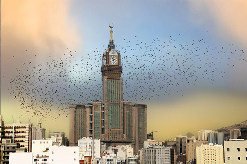 Royal Clock Tower with birds in Makkah, Saudi Arabia.