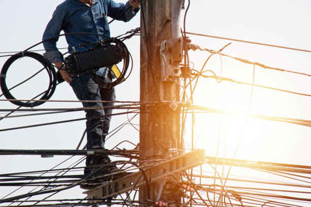 istock High voltage tower work for installing wires and equipment 2010512293