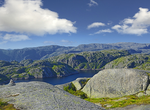 View of the rocky landscape not far from Lysebotn and Suleskard in Rogaland, Tjodanpollen, Norway - landscape of stone fields