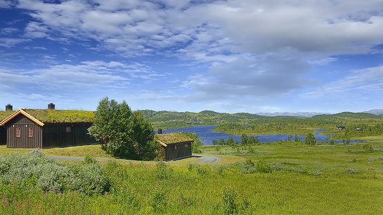 Rauland at Lake Totak, Hardangervidda, Norway - a typical plateau of Norway with a lake and a cottage