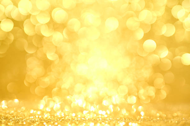 istock Golden bokeh lights on the Merry Christmas background. 2010540066