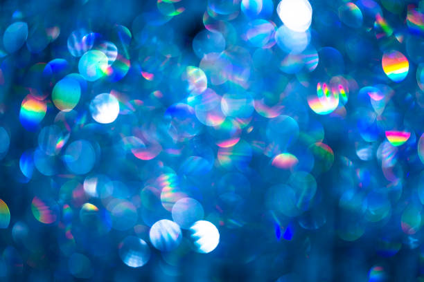 Abstract blurred multi glittering color light at night. Sparkling bokeh defocused background for good holiday concept, design, Christmas and holiday template, banner.