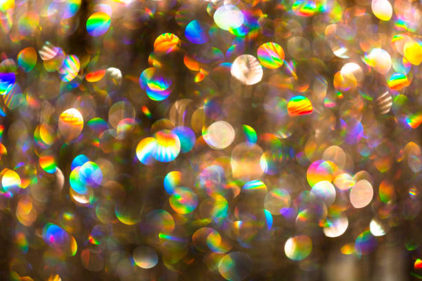 Abstract blurred multi glittering color light at night. Sparkling bokeh defocused background for good holiday concept, design, Christmas and holiday template, banner.