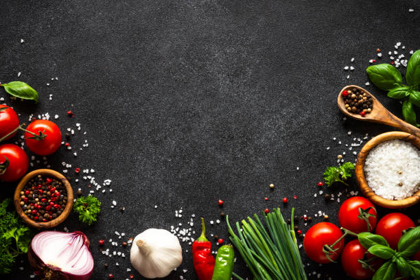 istock Food cooking background on black stone table. 2010550180