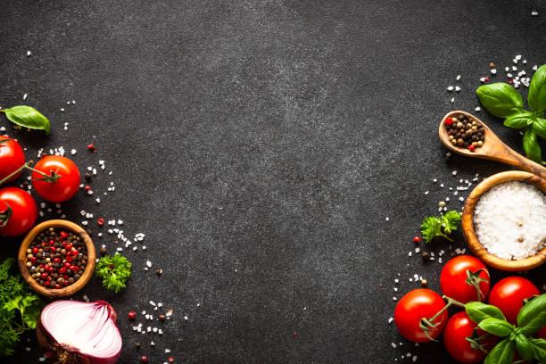 istock Food cooking background on black stone table. 2010552848