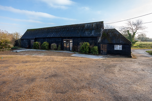 Wickhambrook, Suffolk - Jan 212 2020: Traditional detached farm barn & yard