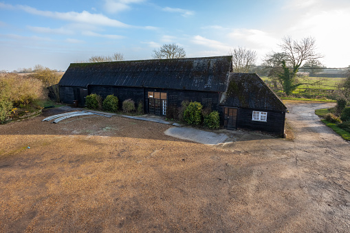 Wickhambrook, Suffolk - Jan 212 2020: Traditional detached farm barn & countryside