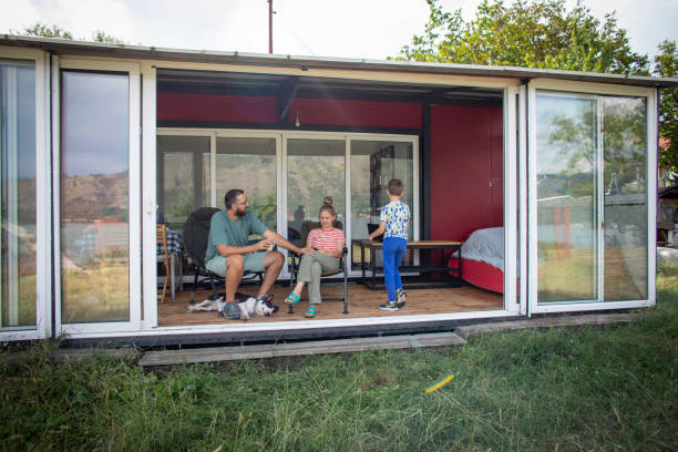 istock Family on vacation in their container house 2010562813