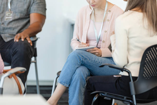 istock Unrecognizable employees sit in the conference room for a training 2010565468