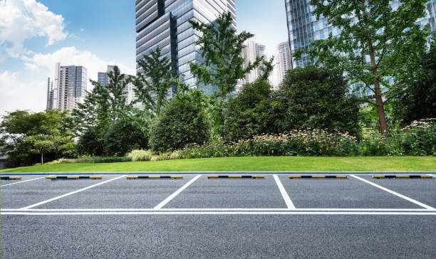 istock Empty parking lot in the office park 2010589286