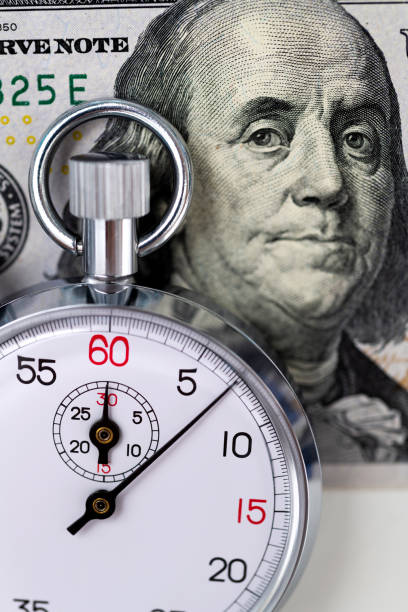 istock A stopwatch on American dollars 2010591412