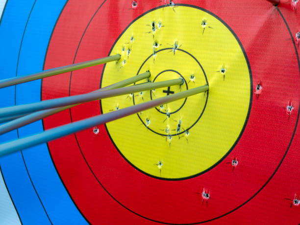 istock Many arrows hitting the archery target, bulls eye 2010635467