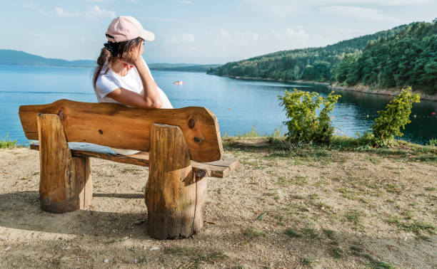 Traveler  Woman  in the summer  mountain with Lake view