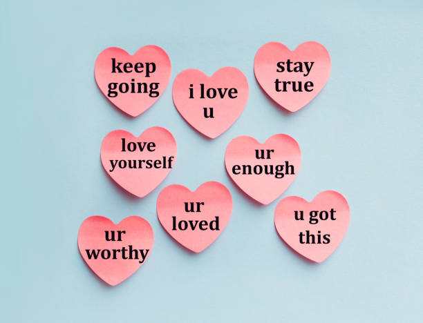 istock Love you written on many heart shape sticky notes 2010670343