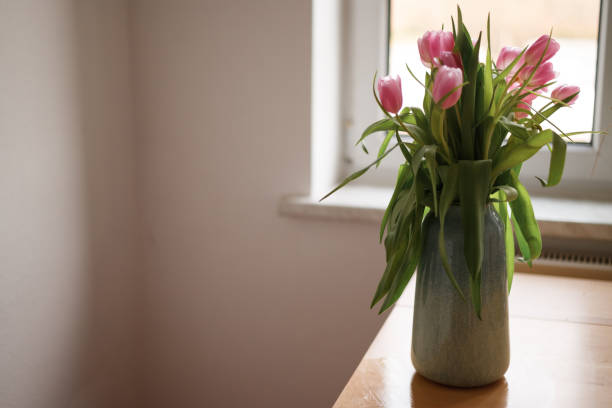 istock Beautiful pink tulips in a vase 2010692486
