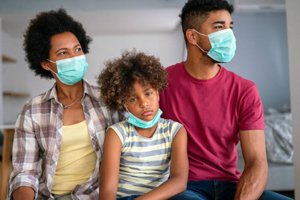 istock Family is wearing facemasks during coronavirus and flu outbreak. Virus and illness protection, COVID 2010715709