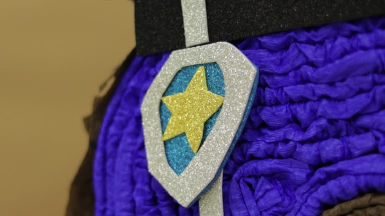 Chase inspired Paw Patrol pinata, close up on foam diamond police badge