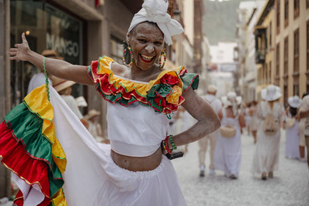Salvador, Bahia, Brazil - December 06, 2015: Women dancing the traditional samba de roda of Bahia with colorful clothes. Salvador, Bahia, Brazil.