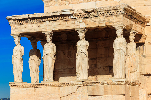 The Caryatid porch of Erechtheion (Erechtheum) or Temple of Athena Polias is an ancient Greek Ionic temple on the north side of the Acropolis in Athens, Greece