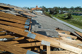 damaged-house-roof-with-missing-shingles