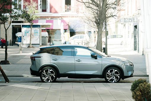Santander, Spain - 13 February 2024: A Nissan Qashqai parked in a street of Santander, Spain