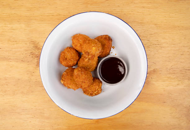 istock View of fried chicken croquettes with bbq sauce 2010856735