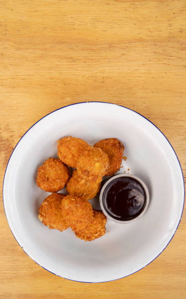 istock View of fried chicken croquettes with bbq sauce 2010857253
