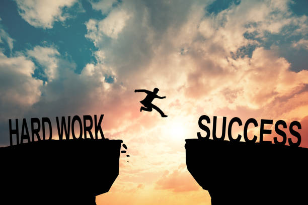 istock Business man jumping to next cliff with risk decision. Hard work success concept. Business strategy concept. 2010860936