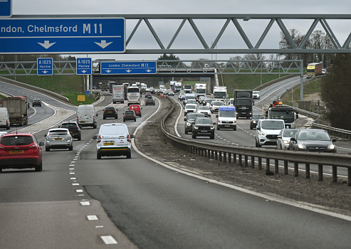 The M11 is a 55 miles motorway that runs north from the North Circular Road in South Woodford to the A14, northwest of Cambridge, England.