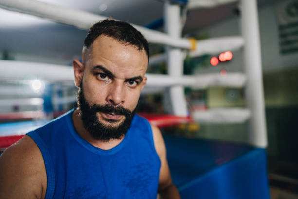 istock Portrait of a boxer man on a boxing gym 2010877021