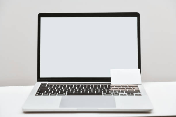 istock Laptop With It's Designated NFC Business Card 2010942671