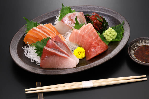 assorted sashimi; tuna(medium fatty), salmon, yellowtail, and sea bream. authentic Japanese dining.