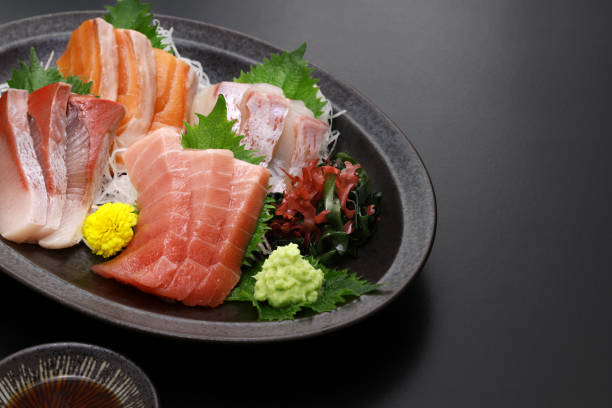 istock assorted sashimi; tuna(medium fatty), salmon, yellowtail, and sea bream. authentic Japanese dining. copy space. 2010995718