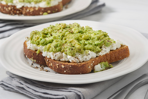 Trending  Cottage Cheese Toast with Creamy Avocado on Whole Grain Bread
