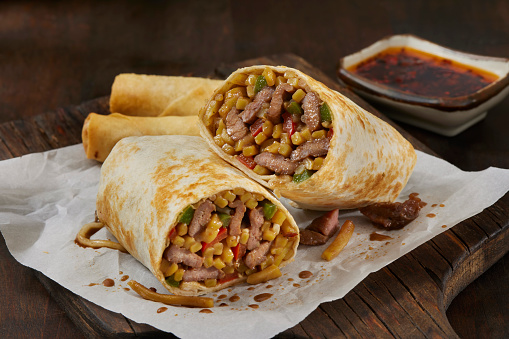 Copycat Chinese Food Burrito, with Szechuan Beef, Stir Fried Vegetables, Shanghai Noodles and Spring Rolls