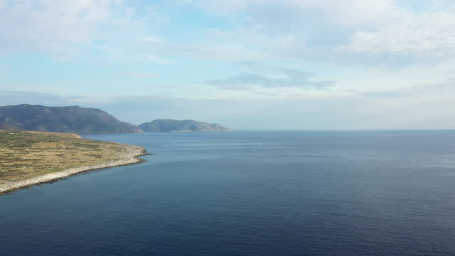 The Mediterranean Sea facing Cape Tenare in Europe, Greece, Peloponnese, Mani, in summer, on a sunny day.