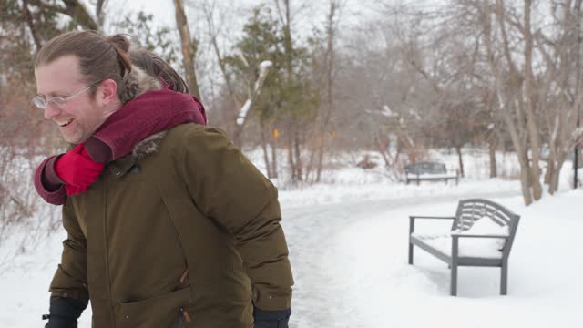 Inclusive Love: Trans Teen Leaps onto His Father's Back in the Snow