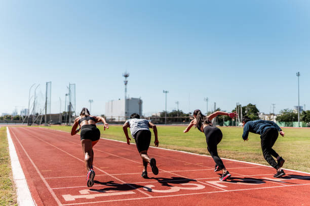 istock Athletes running on track and field stadium 2011064227