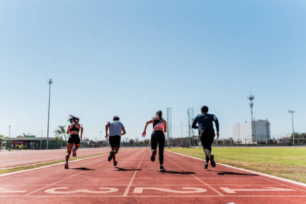 istock Athletes running on track and field stadium 2011064758