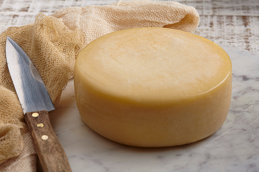 Pecorino cheese on white background, studio isolated photo